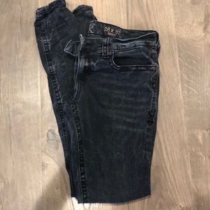 Buckle acid washed black jeans